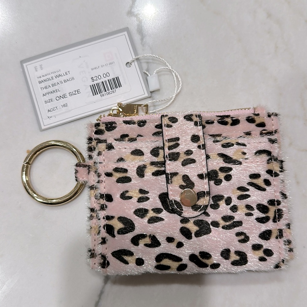 NWT pink faux fur wallet with gold accents